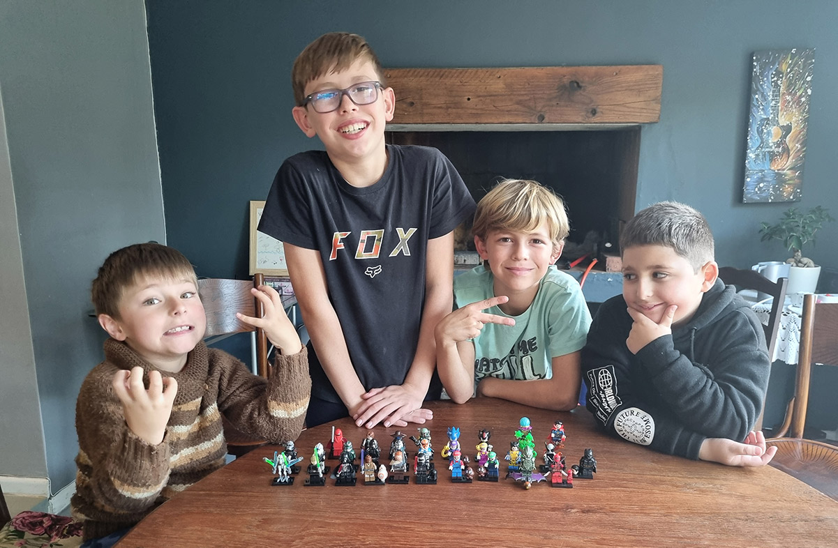 kid smiling to the camera while playing